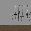 Black Shower Heads In Multiple Styles With Water Spraying On Grey Background