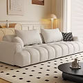 Stylish Living Room With White Tufted Sofa Black Checkered Rug And Wall Art