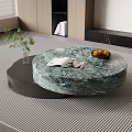 Round Green Marble Coffee Table With Oranges Book And Plant On Modern Rug