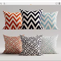 Decorative Throw Pillows with Chevron and Interlaced Patterns in Orange Blue and White Tones 3d model