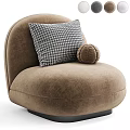 Plush Cream Rounded Single Seater Sofa Featuring Houndstooth Pillow And White Knitted Ball Cushion