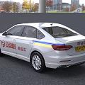 White Sedan Driving Instructor Training Car With Safety Logo And Coach Sign