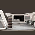 Modern Exhibition Booth Design With Curved Structure Display Screens And Tables For Zhonggang Real Estate