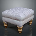 Elegant White Upholstered Ottoman With Gold Carved Legs And Tufted Top