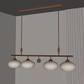 Modern Brass Chandelier With Four White Light Shades And Wooden Accents In Minimalist Interior
