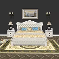 Double Bed With Ornate White Headboard Blue Pillows Gold Bedspread Nightstands Lamps And Decorative Rug