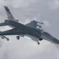 Two Seater Fighter Jet Flying In Cloudy Sky With Mounted Weapons And Extended Landing Gear 3d model