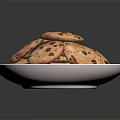Delicious Chocolate Chip Cookies on a White Plate Filled with Melty Chocolate Chips