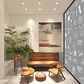 Modern Bubble Tea Shop Interior With Cozy Seating Marble Counter Wall Art And Green Plants
