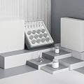 Minimalist Perfume Cosmetics Display Interior With White Stands And Glass Bottles