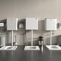Modern Three White Urinals Against Gray Walls With Trash Cans Toilet Paper Holders Flushing Devices