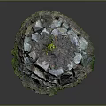 Natural Stone Pile Structure With Green Grass And Small Plant On Top