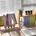 Wooden Bookcase With Books Open Book Blue Folders Small Plants And Pencil Holder On Study Desk