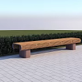 Outdoor Wooden Bench With Curved Top And Stone Legs On Paved Ground By Green Hedge