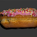 Pink Frosted Donut With Colorful Sprinkles On Black Background With Reflection