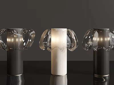 Three Modern Table Lamps Featuring Transparent Glass Shades And Metal Bases Lit 3d model