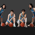 Female basketball players in blue WINGS jerseys holding basketballs posing together in black studio