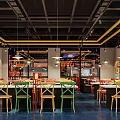 Vibrant Restaurant Interior With Red Walls Murals Yellow Pendant Lights And Colorful Chairs