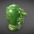 Green Ceramic Tea Set with Intricate Carved Dragon Motif and Decorative Handles on Base
