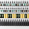 Stylish Wine Bottles And Glasses Display With Black Gold Green Bottles And Labels