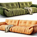 Plush Modern Sectional Sofa With Green Orange Tufted Design And Cozy Blanket
