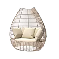Teardrop Shaped Rattan Hanging Chair With Beige Cushions For Comfortable Seating