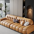 Modern Living Room Interior With Tan Leather Sofa Throw Pillows And Plants Near Large Windows