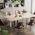 Modern Dining Area With Marble Top Table Six Brown Chairs Fruits Flower Vase And Cabinets