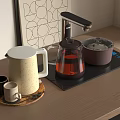 Modern Kitchen Appliances on Wooden Countertop Including Electric Kettle Glass Teapot Insulated Pot and Mugs