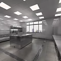 Professional Commercial Kitchen Interior With Stainless Steel Worktable And Ventilation Hood