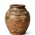 Rustic Ceramic Jar With Brownish Mottled Texture And Woven Rope Decorations On Neck