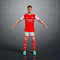 A Man Wearing Red Arsenal Jersey White Sleeves Red Shorts Striped Socks And Colorful Cleats