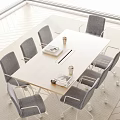Light Wood Conference Table With Gray Office Chairs Coffee Cups And Documents In Modern Space