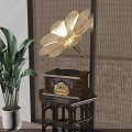Vintage Gramophone With Decorative Horn On Wooden Stand In Woven Wall Room With Green Plant