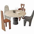 Modern Round Dining Table Set with Black Base and Four Different Colored Chairs 3d model