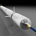 White Missile With Silver Nose Cone Blue Tail Section And Green Fins