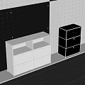 White and Black Chest of Drawers With Multiple Drawers Open Compartments and Polka Dot Walls