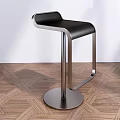 Modern Bar Stool With Metal Frame And Black Seat In Minimalist Interior Space