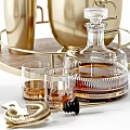 Liquor Bottle and Cocktail Glasses with Gold Ice Bucket Bar Tools on Wooden Tray