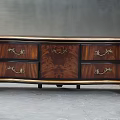 Vintage Wooden TV Stand With Ornate Gold Handles Multiple Drawers And Decorative Legs