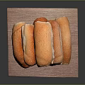 Golden Brown Bread Rolls Stacked on Wooden Tray With Soft Interior
