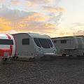 Parked RVs and Pickup Truck in Outdoor Area with Cloudy Sky