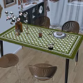 Elegant Dining Table Set With Green White Checkered Tablecloth Rattan Chairs And Decorative Tableware