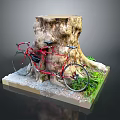 Red Bicycle Leaning Against Tree Stump With Gravel And Green Plants