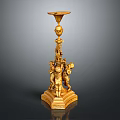Gold Carved Candlestick Sculpture With Putti Figures And Ornate Base