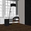 Inflatable Black Chair In Modern Living Room With Floor Lamp And Wooden Floor
