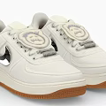 White Nike Sneakers Featuring Silver Swoosh Logo Tongue Circular Badge And Brown Rubber Sole