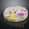 Assorted Food Platter With Dumplings Sauce Cups Lemon Slice Mango And Dragon Fruit