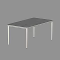 Modern rectangular dining table with sleek metal legs and smooth gray tabletop