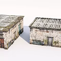 Two Old Weathered Brick Buildings With Corrugated Metal Roofs And Wooden Doors
